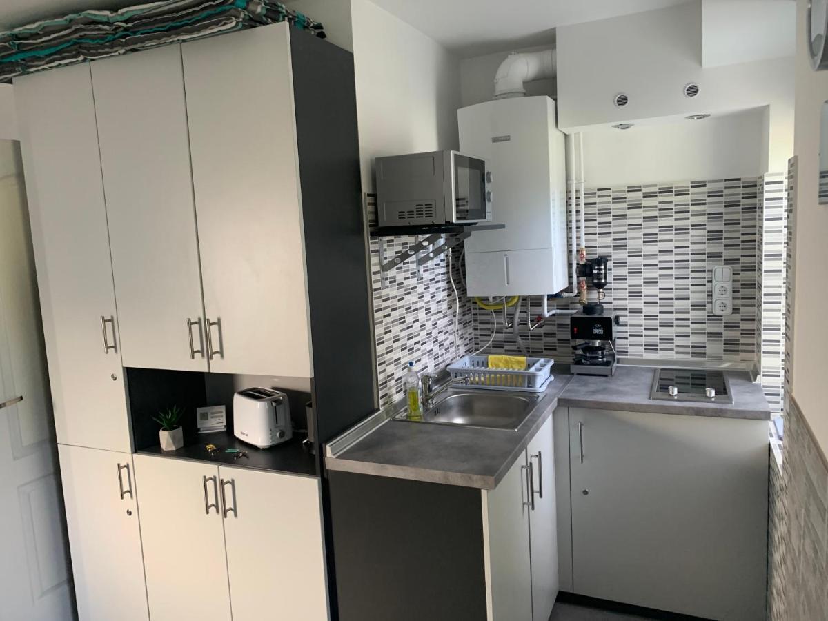 Komo Apartment Buk Exterior foto